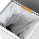 Illustration for article titled A Garbage Can With a Vacuum Just Made Dustpans Obsolete